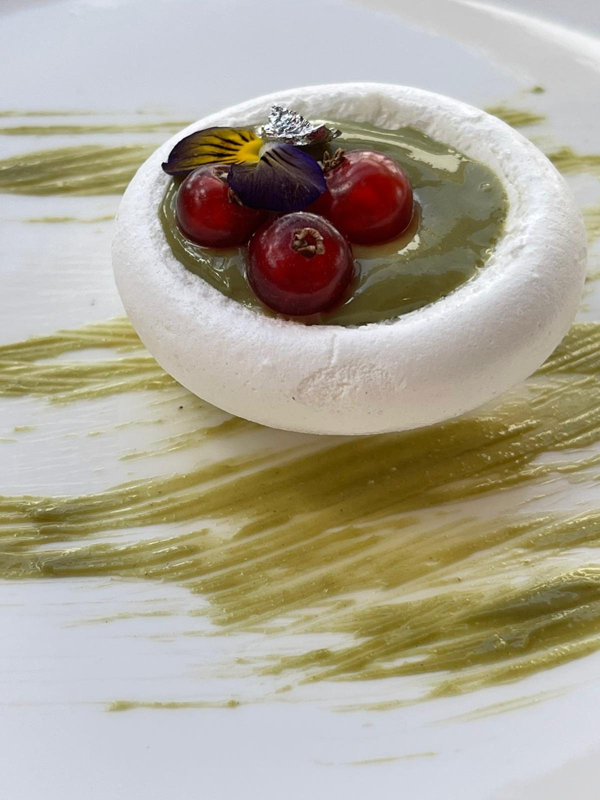 Pistachio and redcurrant meringue
